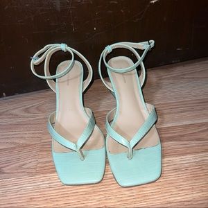 Pastel green faux snakeskin heels